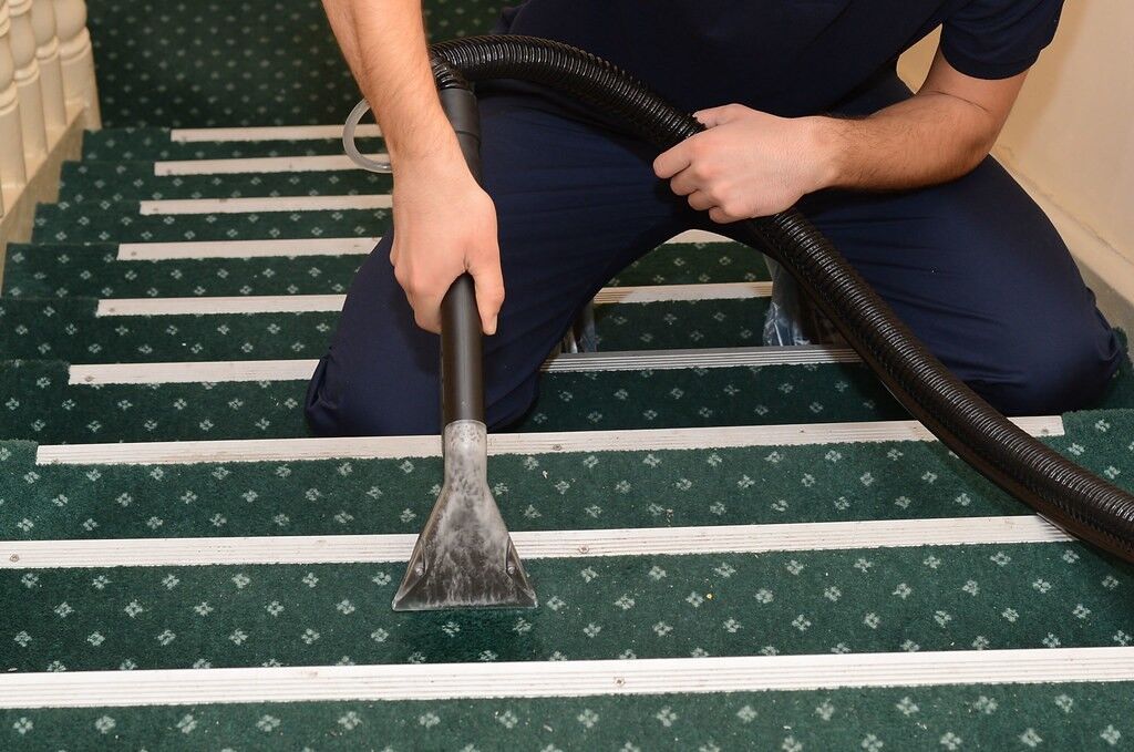 cleaning stair carpet with vacuum